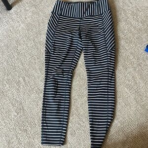 Athleta leggings - Navy Blue with White stripes.